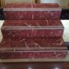 Đá ốp lát bậc cầu thang 47×100 vân đỏ trắng bo đầu chạy rãnh chống trơn
