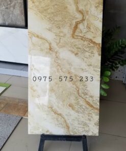 Gạch cao cấp nhũ vàng 60×120 khắc kim đồng chất bóng kiếng 24