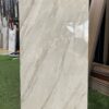 Đá ốp tường 40×80 trung quốc trắng nhũ bạc vân xám bóng kính