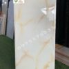 Gạch men 40×80 vát cạnh kem vân vàng bóng kính