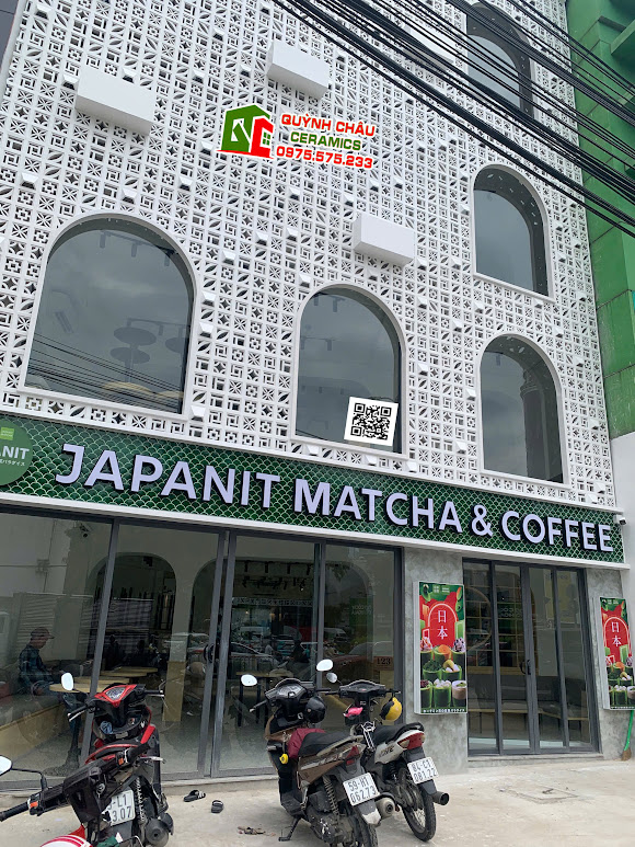 Mẫu gạch vảy cá ốp mặt tiền màu xanh men rạn