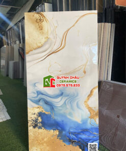 Gạch 60×120 bóng kính nhũ vàng vân đá xanh dương