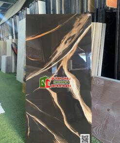 Gạch ốp lát 60×120 bóng kính đen vân đá vàng cam